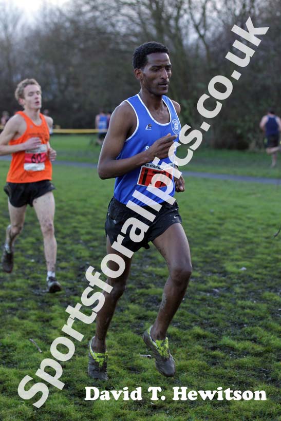 Eritrean athlete Weynay Ghebresilasie running for Sunderland Harriers on his way to third place in the Start First North East Harrier League, Jarrow.
